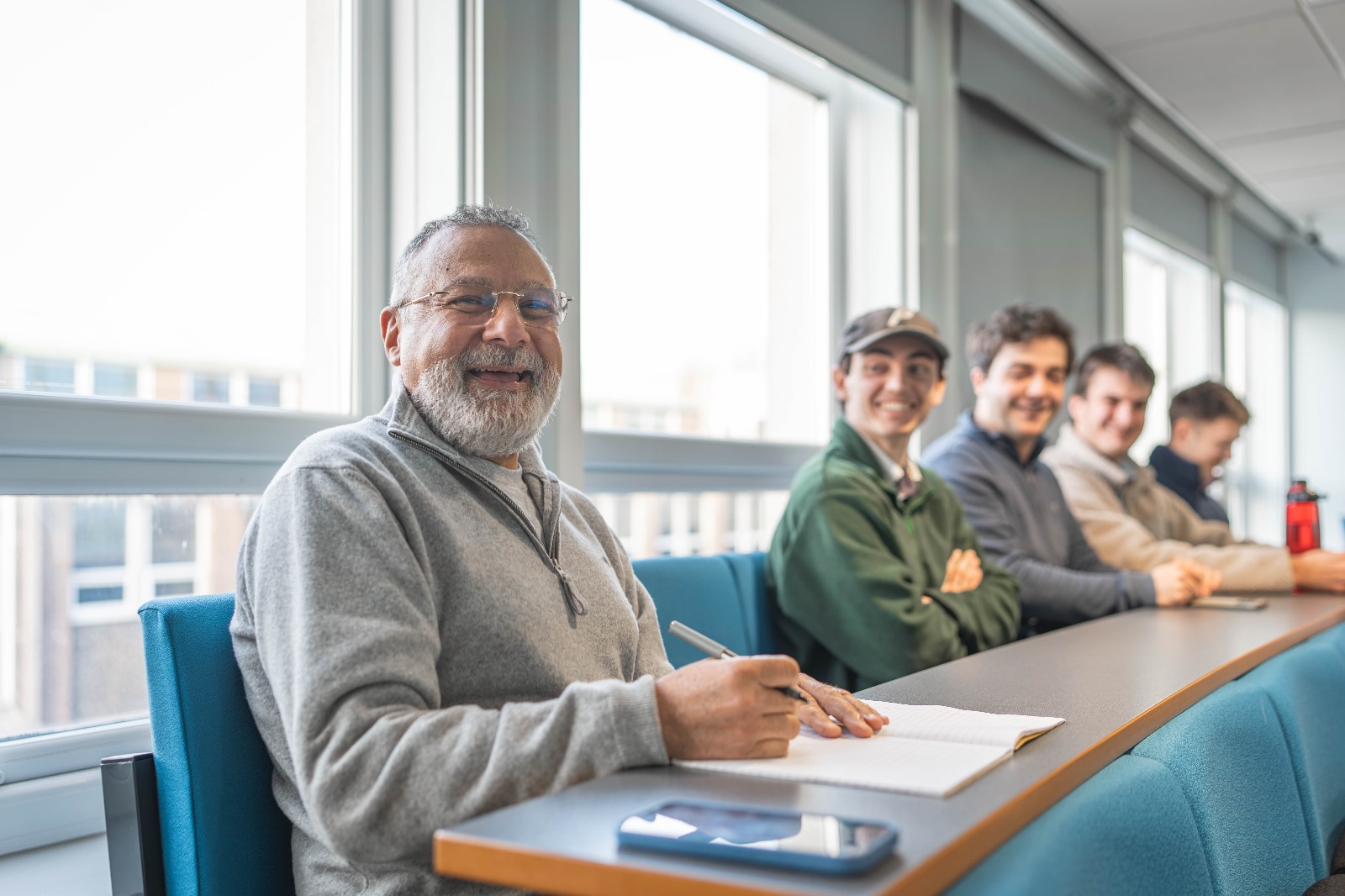 A member of staff offering academic support